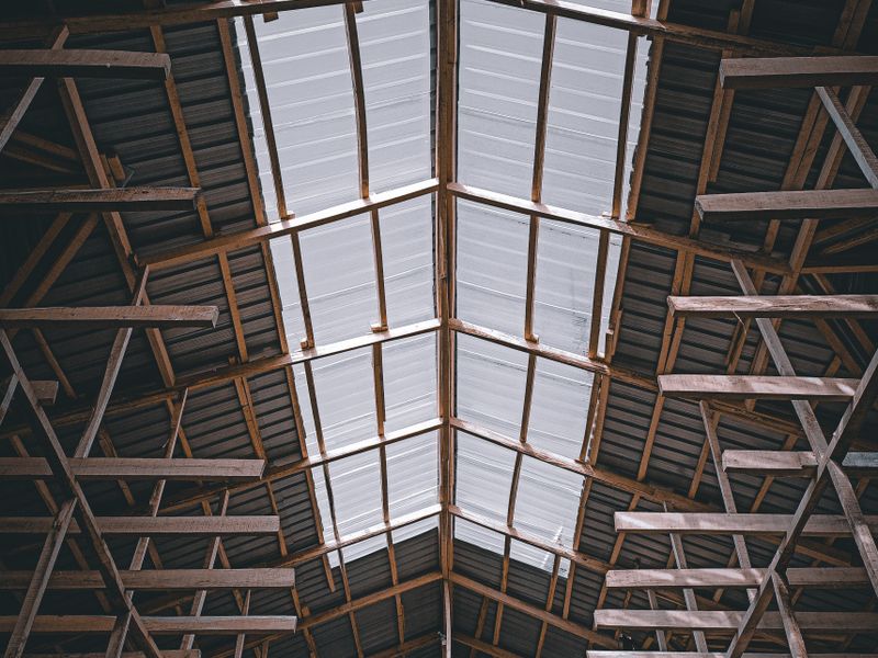 Roof waterproofing coating applied to a concrete rooftop